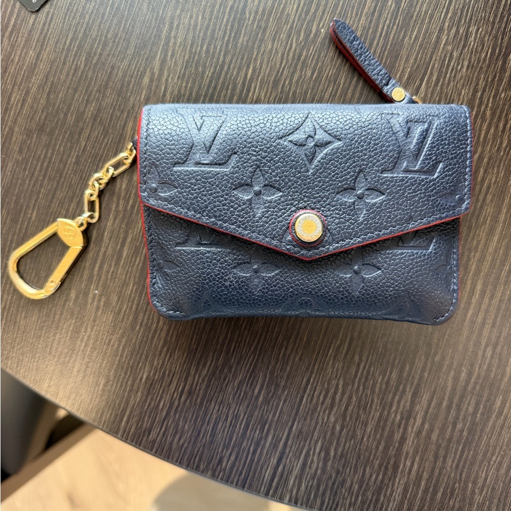 Louis Vuitton Black Monogram Pouch with Gold Accent